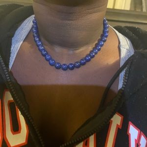 Blue pearl with a little spark on gold